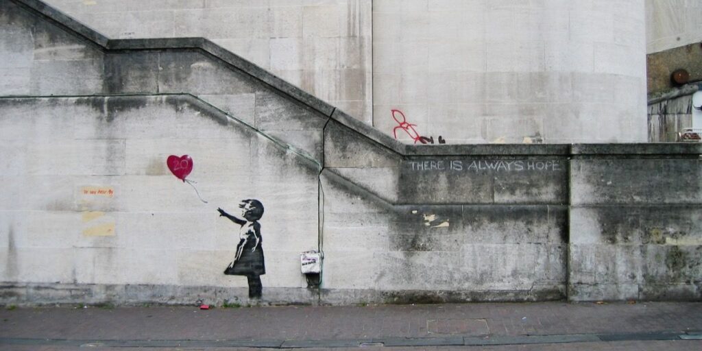 Banksy, Girl with Balloon. Photo by Dominic Robinson, via Flickr.