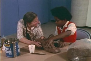  Edith Kramer and her student working on a clay sculpture. Via YouTube.