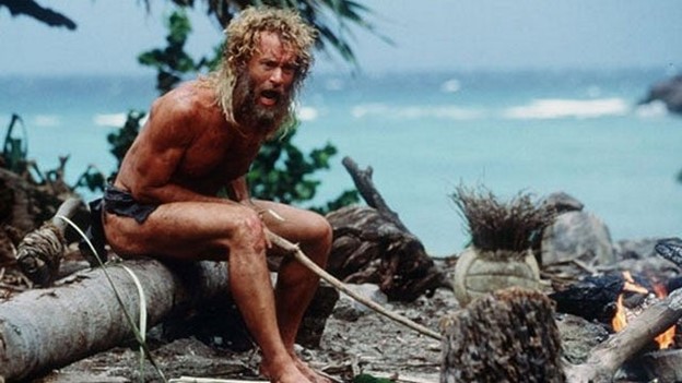 Tom Hanks with Wilson in Cast Away. Via etonline.com